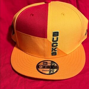 New Era Two-Tone Red and Yellow Snapback Hat